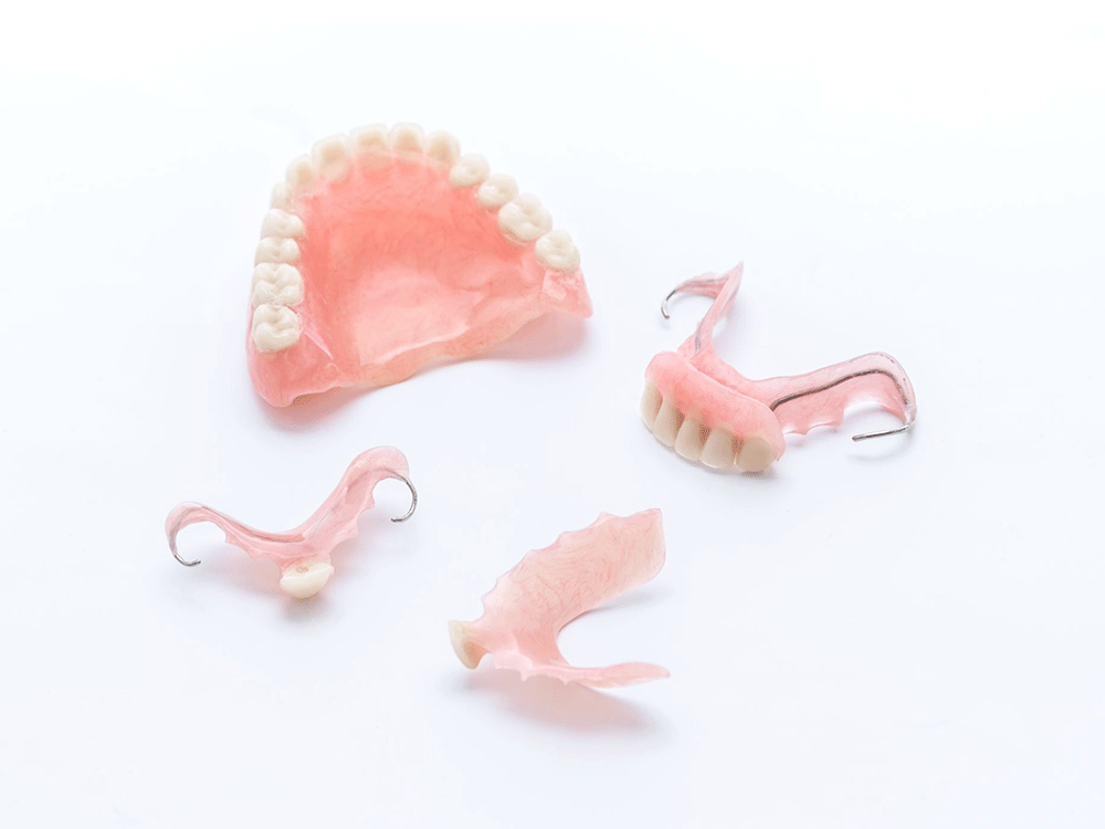 photo showing full, partial and implant-supported dentures.