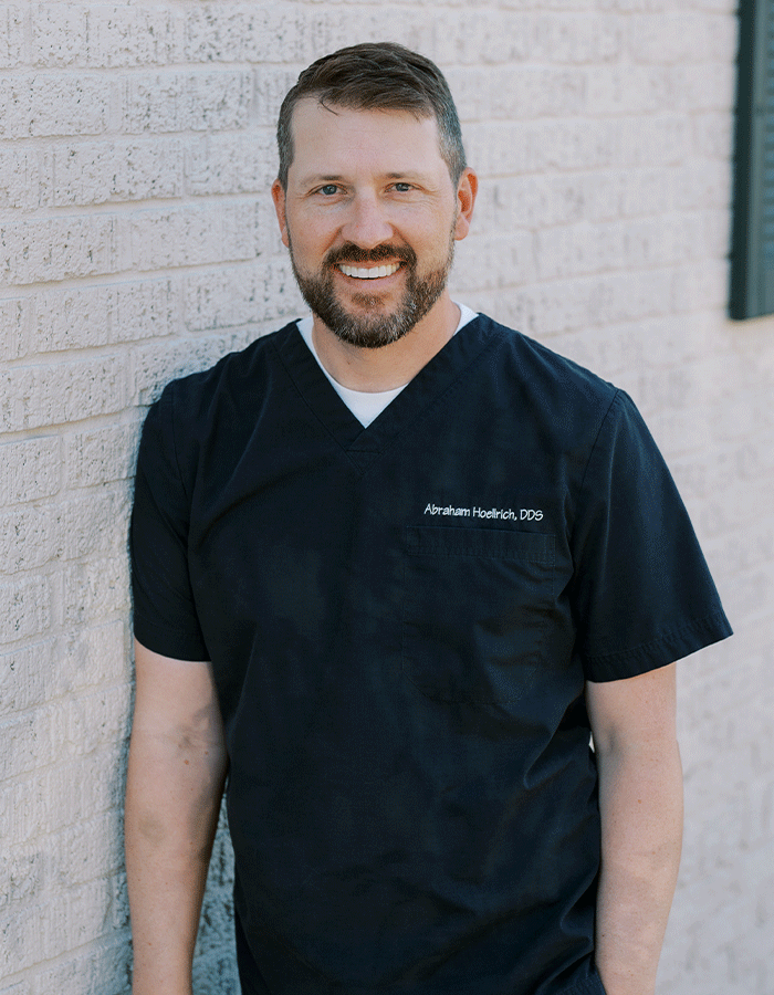 Headshot of Dr. Abraham Hoellrich, dentist and owner of Grandview Dental Care in Columbus, Ohio.