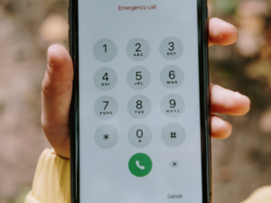 Picture of a cell phone on an emergency call screen.
