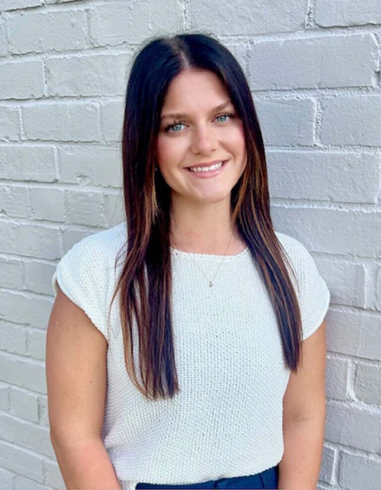 Headshot of dental hygienist, Casey.